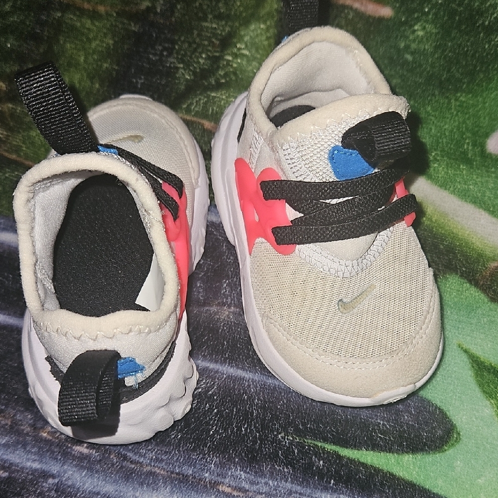 Nike Cream and Pink Sneakers with Modern Silhouette